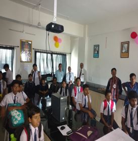 Science Association program inauguration by Principal Dr. S. N. Nikam and activity with High school students.